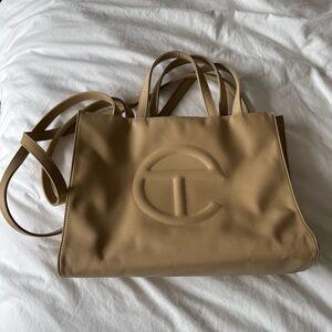 Telfar medium shopping bag in cream